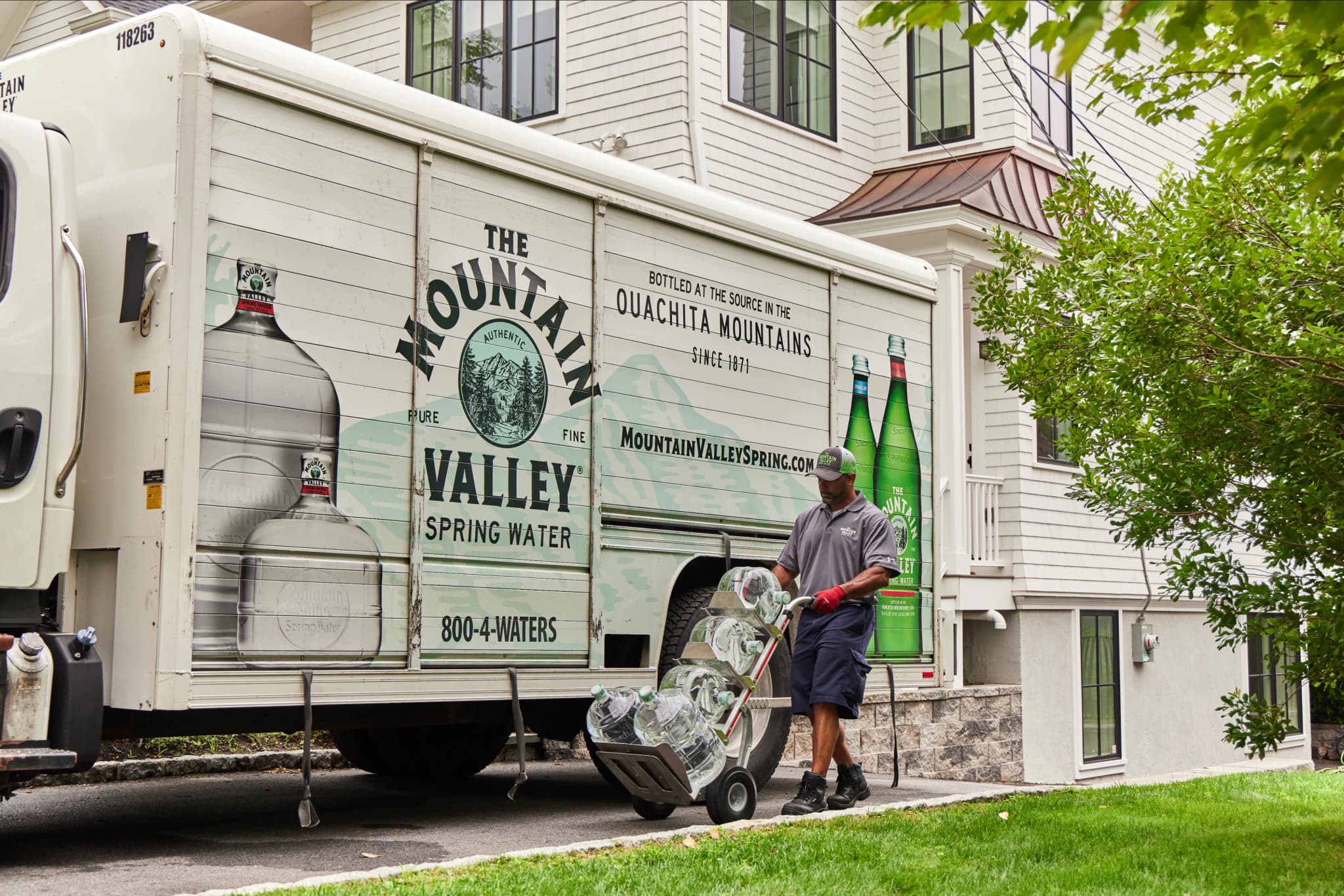 Mountain Valley Water - delivery driver unloading truck