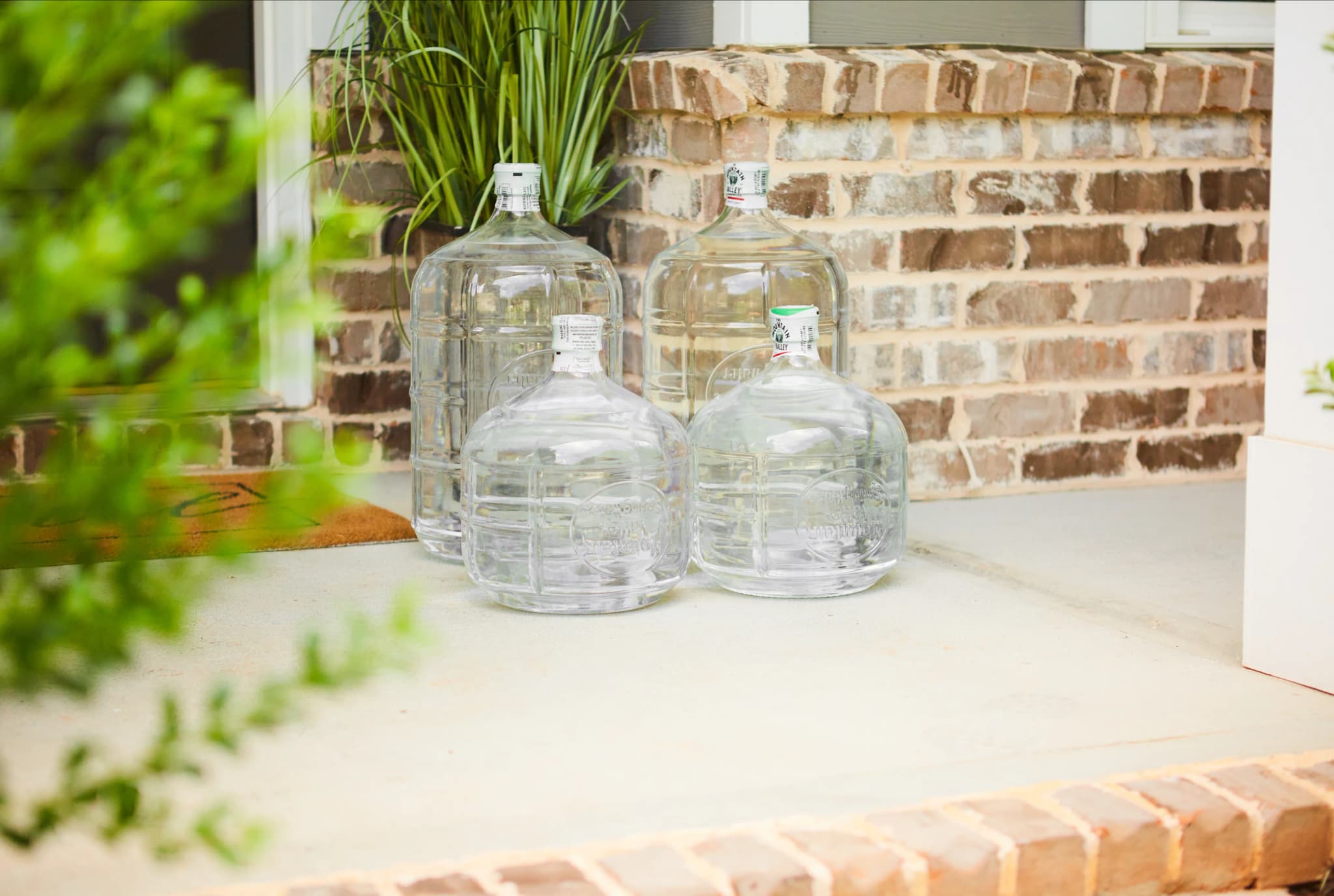 Mountain valley glass bottles on porch